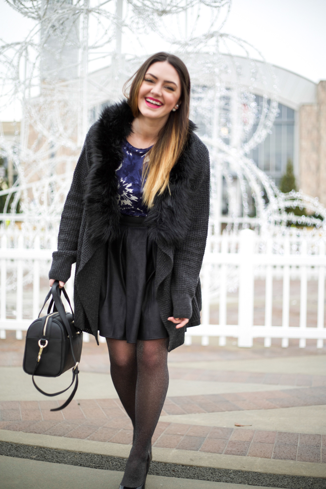 faux leather skirt, pointed toe pumps, knit cardigan with faux fur, crop top, sparkly tights, Karen Walker