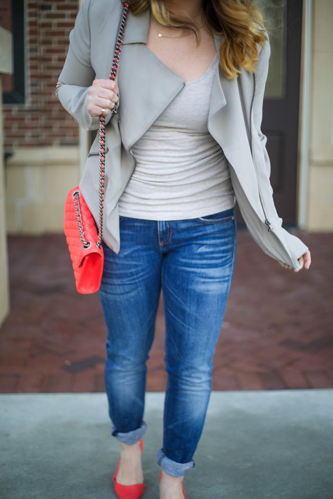 Mae Amor- grey moto jacket, red pointy toe flats, red quilted bag, rag & bone jeans, bold lip, medium length ombre