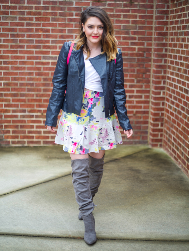 Mae Amor- floral skirt, leather jacket, pink backpack, white tee, grey otk boots