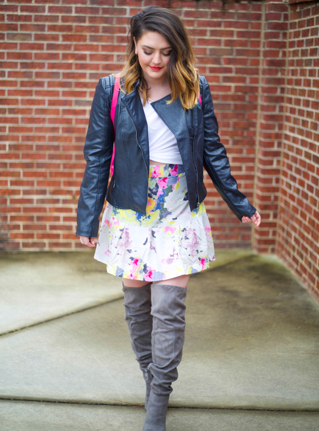 Mae Amor- floral skirt, leather jacket, pink backpack, white tee, grey otk boots