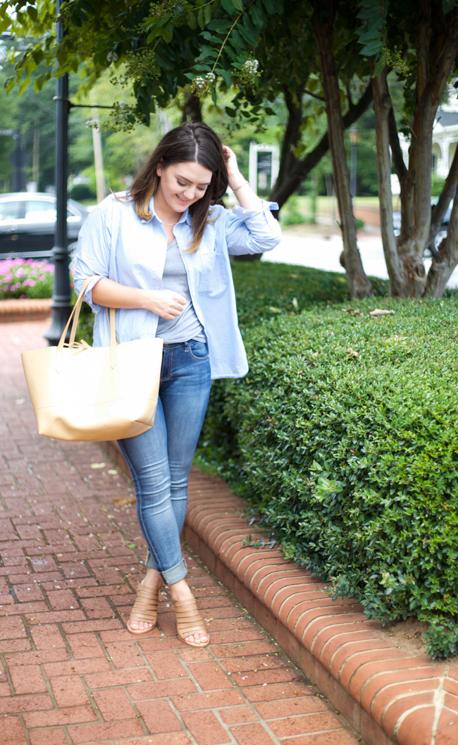 Casual Summer Outfit via Mae Amor @maeamor DL1961 jeans, Dolce Vita heels, striped button down, J. Crew tan bag, grey t-shirt