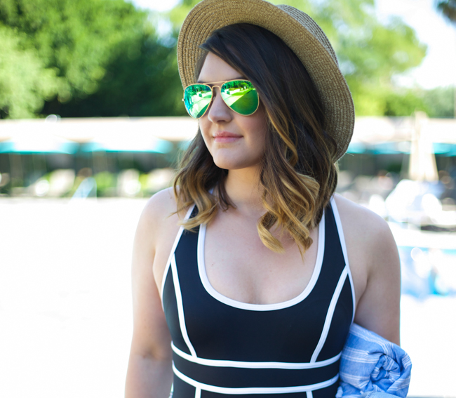 Mae Amor (@MaeAmor)- Black and White Floral Shorts, SPANX one piece swimsuit, denim shirt, boater hat, mirrored Ray-Ban aviators