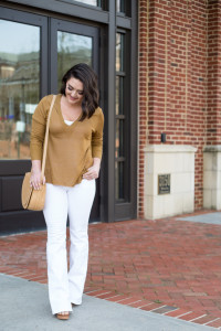 White Flare Jeans + Camel V-Neck Sweater via @maeamor
