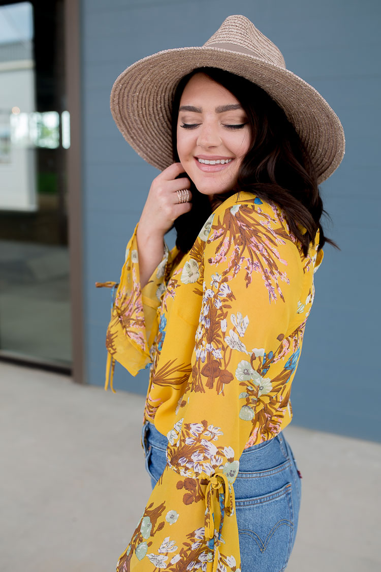 Yellow Floral Bell Sleeve Blouse | Mauve Suede Knot Slides | Straw Bag | High Waisted Denim Cutoffs | Straw Hat | via @maeamor